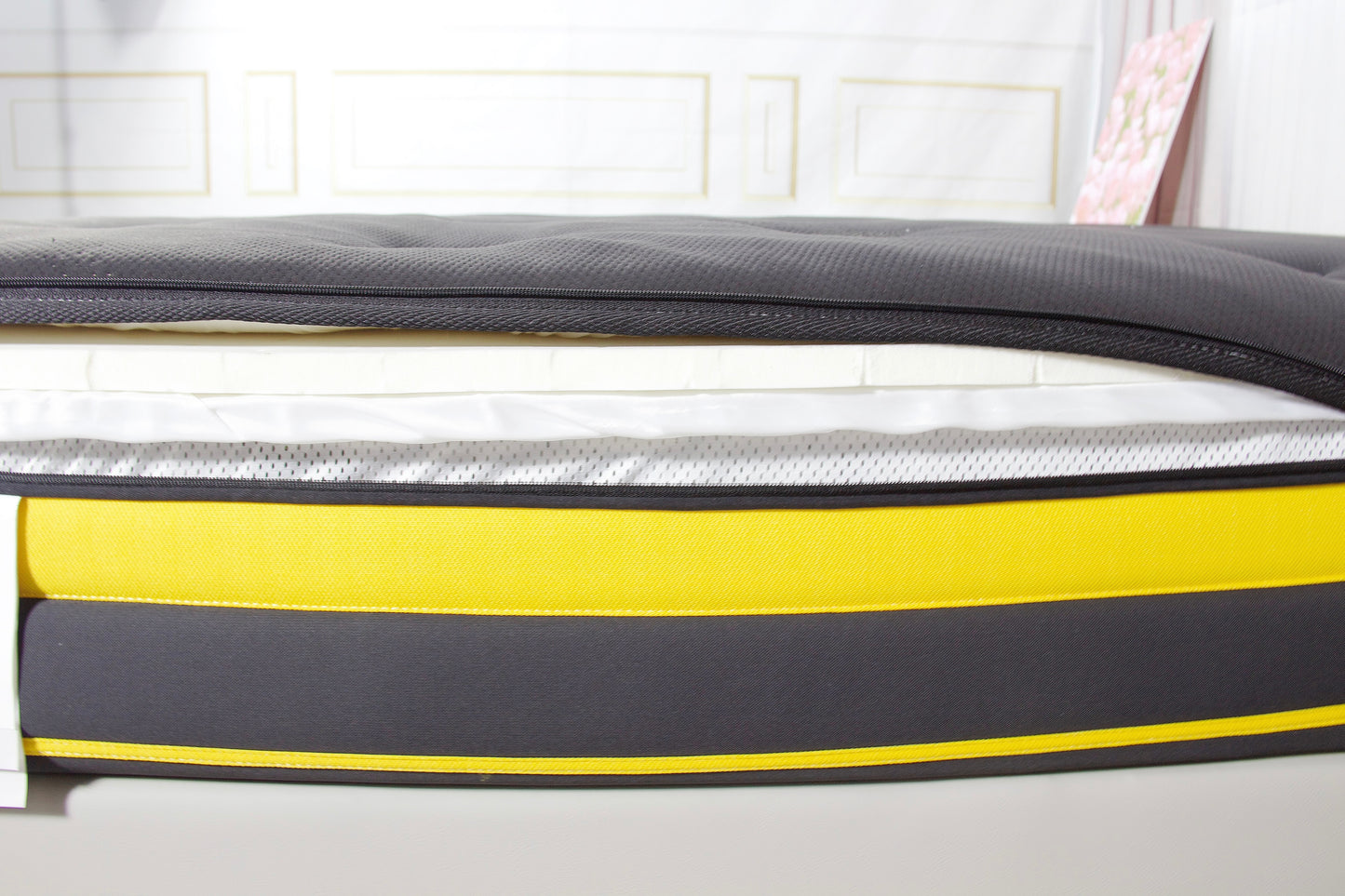 Black mattress encasement made from premium cotton with a zippered closure for full mattress protection.