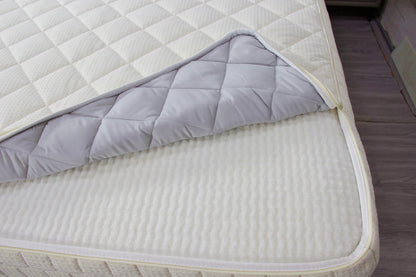 DiamondWeave Luxe Mattress Zip-Cover Ivytress featuring a diamond-textured design with full-zip closure, offering superior mattress protection and bedroom elegance.