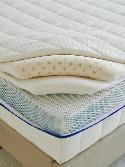 Whimsy Cotton Luxe Zip-Pad Ivytress mattress pad featuring a zippered design, crafted from soft cotton to provide hypoallergenic protection against dust mites and allergens, adding comfort and charm to your sleep environment