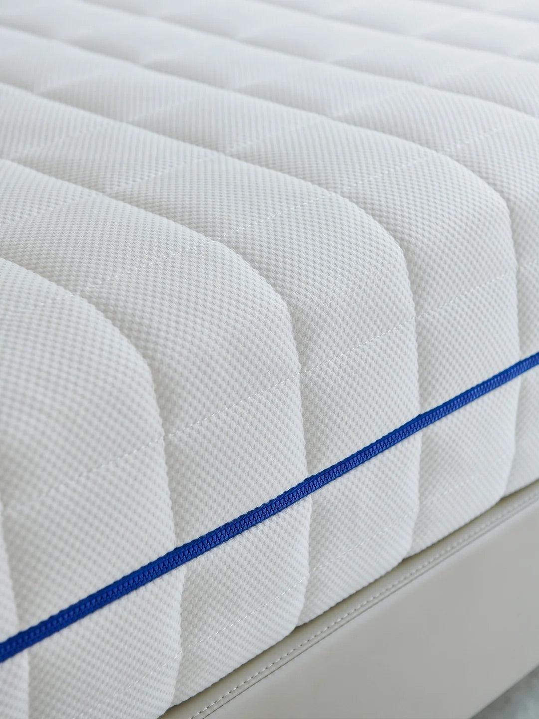 Twilight Cotton Luxe Zip-Pad Ivytress mattress pad with a zippered design, crafted from soft cotton for hypoallergenic protection against dust mites and allergens